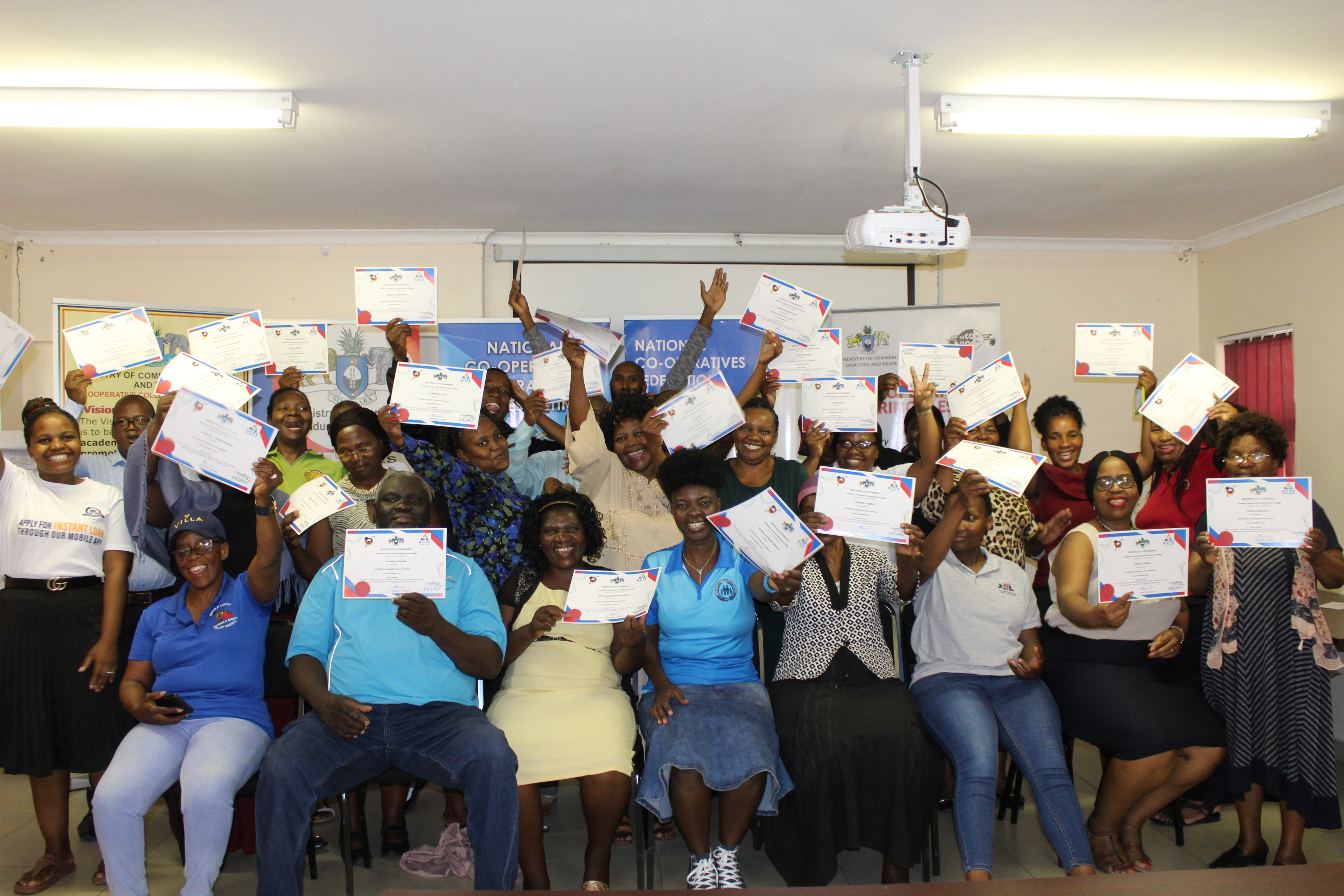 Co-operators posing for a group photo after the workshop with certificate